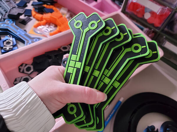 Green TRON fursuit tags