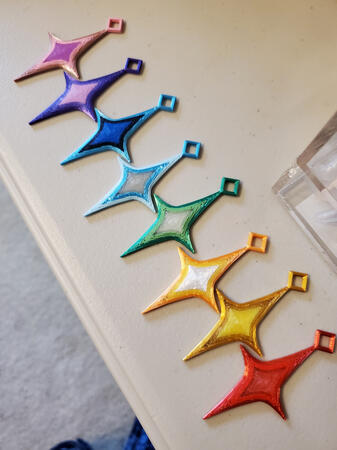 Rainbow array of fursuit charm earrings/pendants